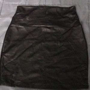 Black mini skirt , never worn